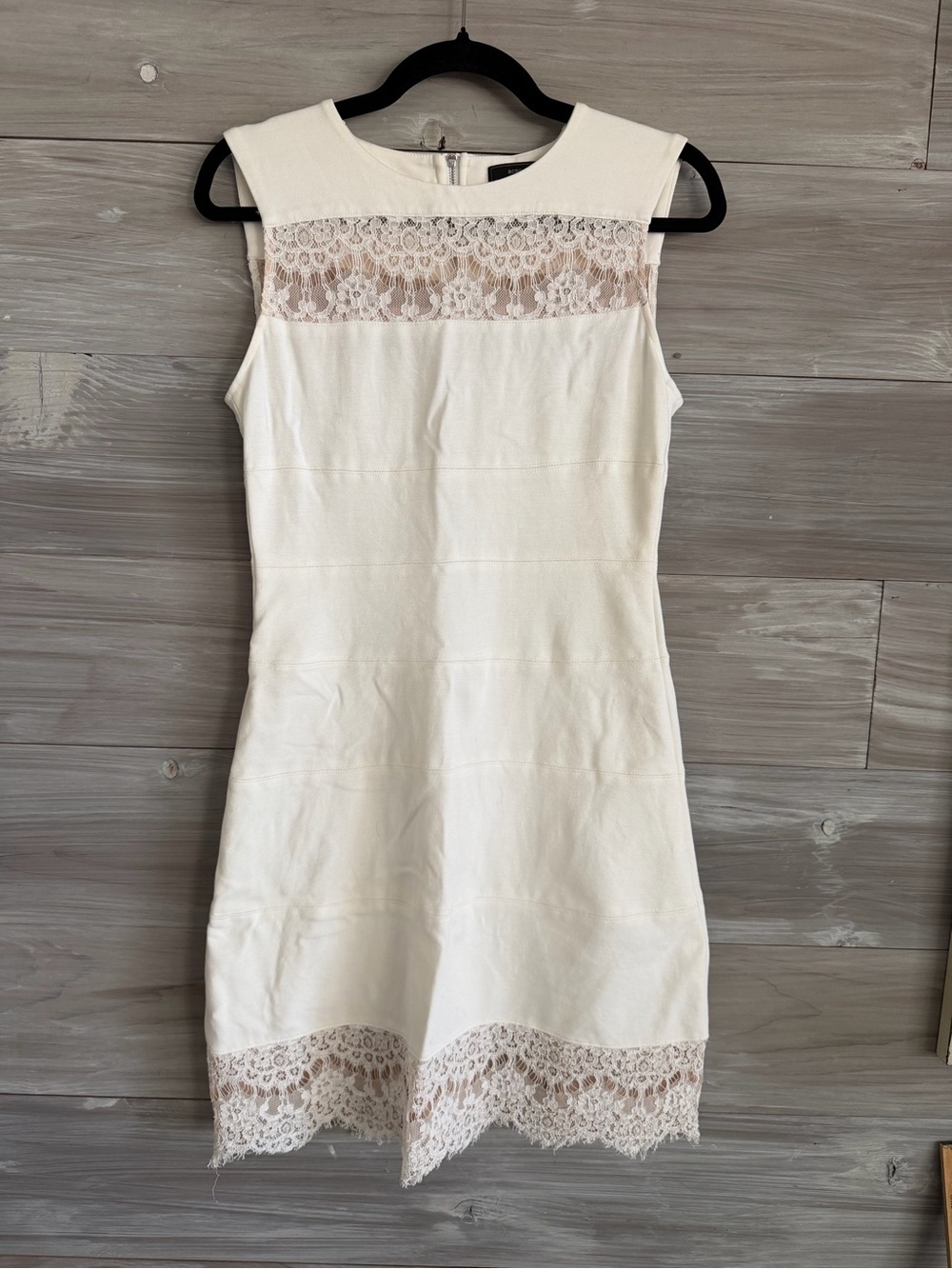 BCBGMaxAzria Sleeveless White Lace-Trim with peekaboo chest cutout Dress